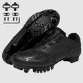 Black cycling shoes with cleats and hardware on a white background