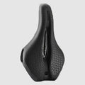 Black bicycle saddle with textured surface on a white background