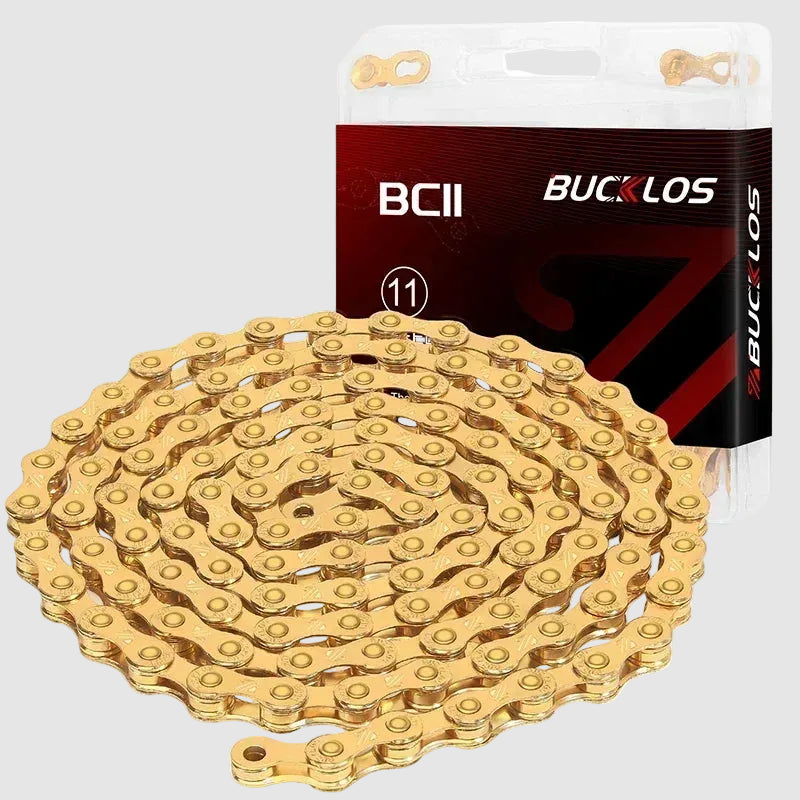 Gold bicycle chain with BUCKLOS packaging on a white background