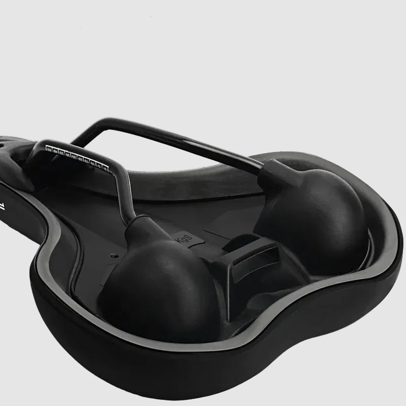 Black scooter seat with spherical shock absorption design on a white background