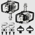 Pair of bicycle pedals with additional components on a white background
