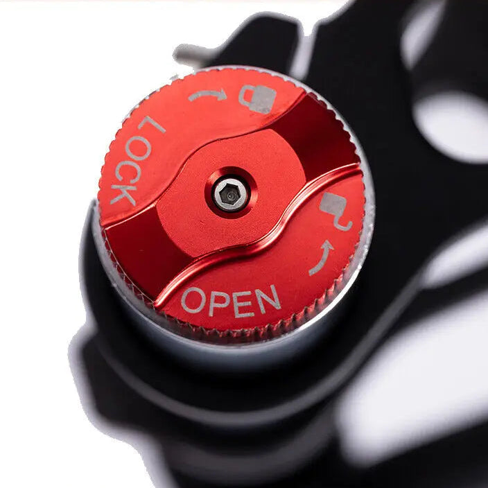 Red lockout switch with 'LOCK' and 'OPEN' labels on a black background