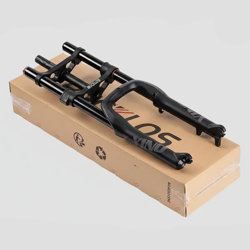 Black bicycle fork on a cardboard box with 'Bucklos' branding.