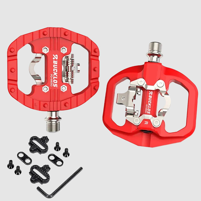 Red bicycle pedals with hardware on a white background, featuring the Bucklos brand.